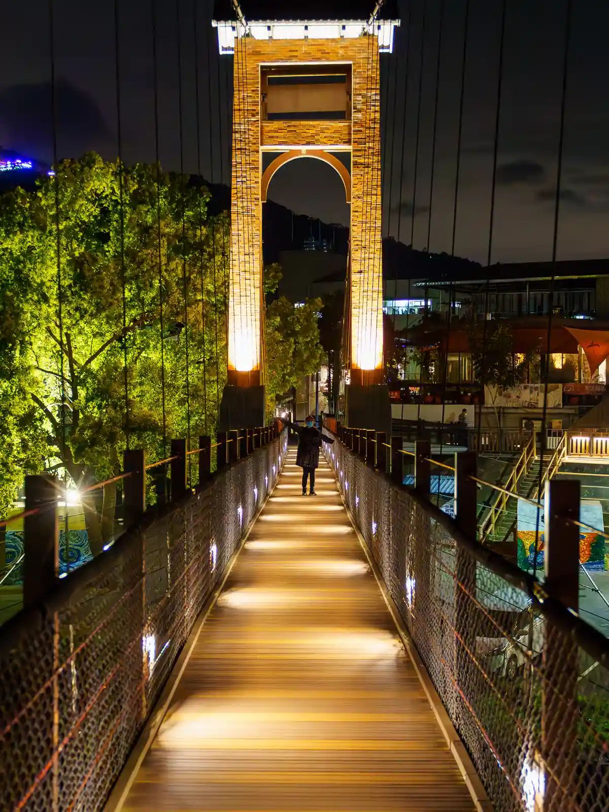 The crowded old street of Neiwan with the mountain rising high in the back (left), and the suspension bridge in Nanzhuang (right)